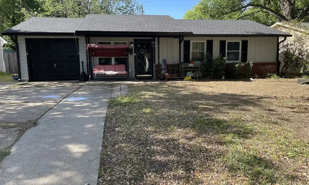 Hail Damage Roof Repair crew at work on a residential roof in Jacksonville